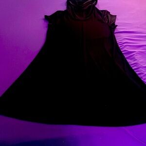 Black stretchy/spandex dress. I believe it has some sort of face mask/turtle nec